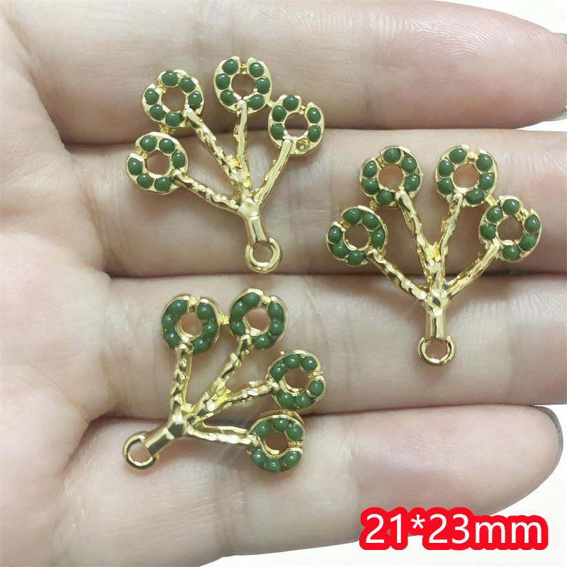 卸売 50 ピース/ロット緑色ビーズ漫画の木の花の形の合金フ - Men Accessories Locket のレビューと価格
