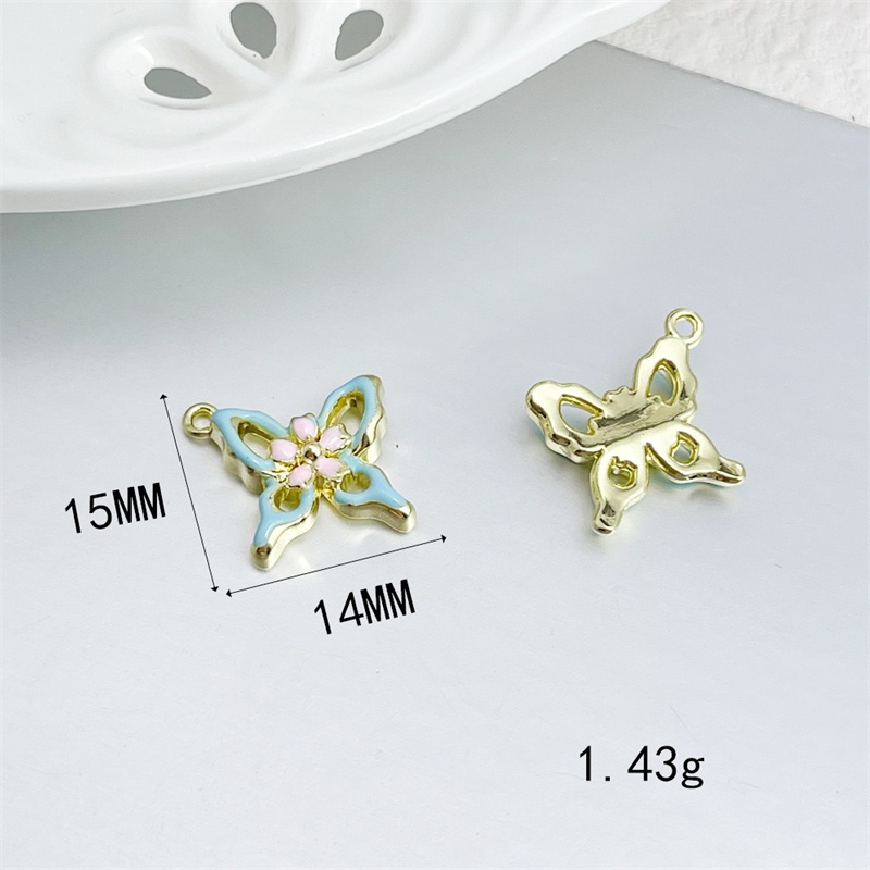 卸売 50 ピース/ロットドロップオイル動物漫画蝶の形合金フ - Men Accessories Locket のレビューと価格